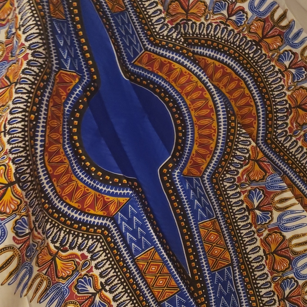 Belted Bluetooth and White African print skirt